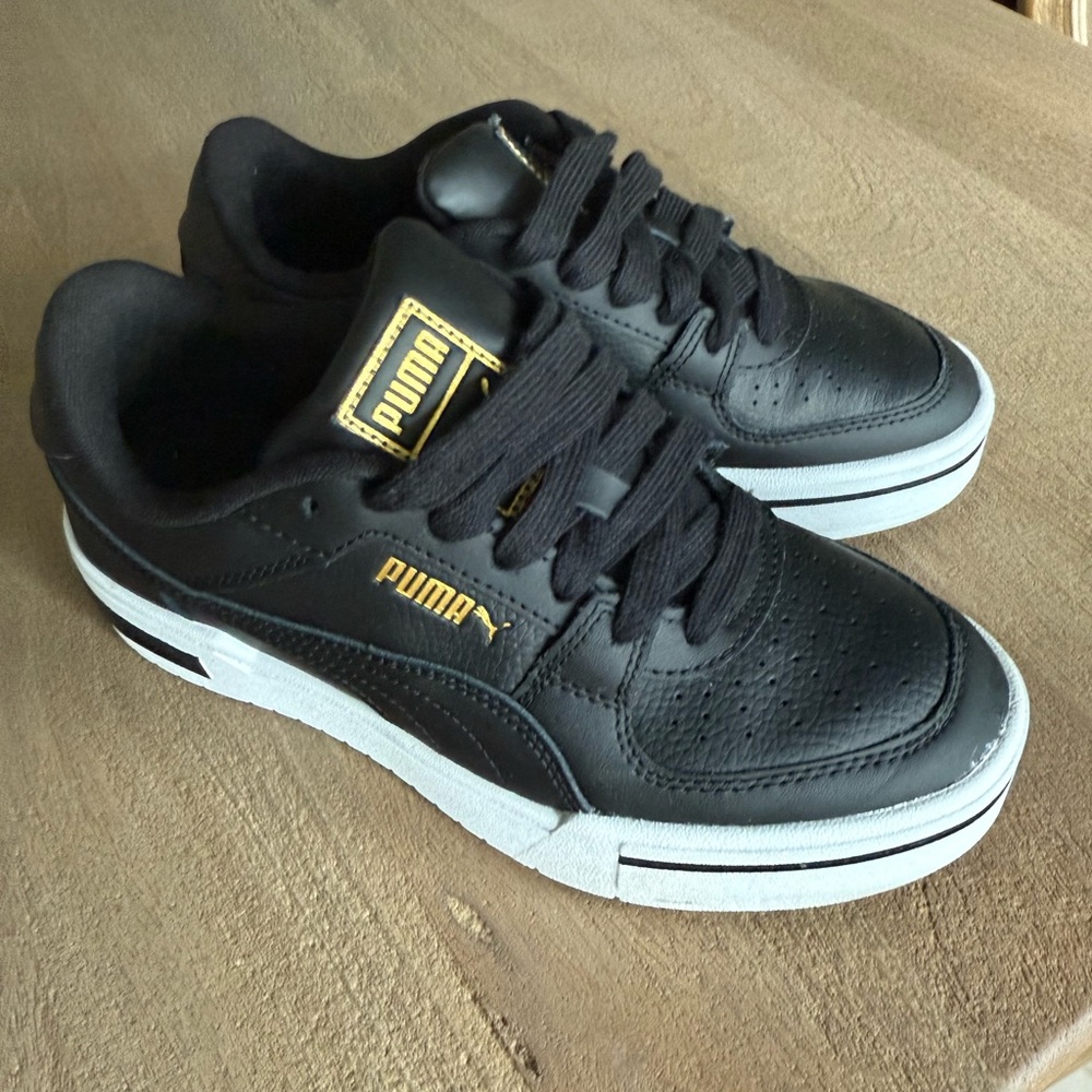 Puma Kids Black and Gold Sneakers